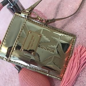 Michael Kors luggage tag.